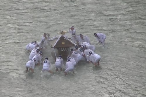 Mikoshi cleansed by carriers