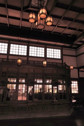 Ticket vending booth and ceiling lamp at concourse of Taisha Station