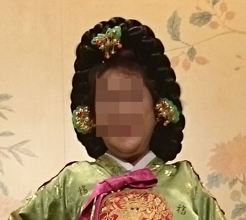 重いカツラ