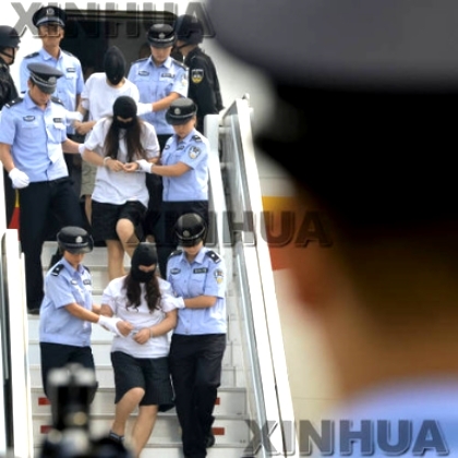 アンゴラで中国人標的に犯罪の３７人、北京へ強制送還　出展　新華社.jpg