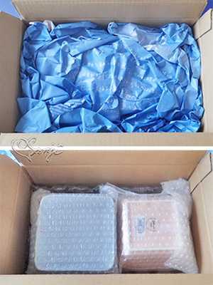 段ボールのフタを開けると緩衝誌で保護され、その下にイッタラ / ティーマ スクエアプレート 12×12cm