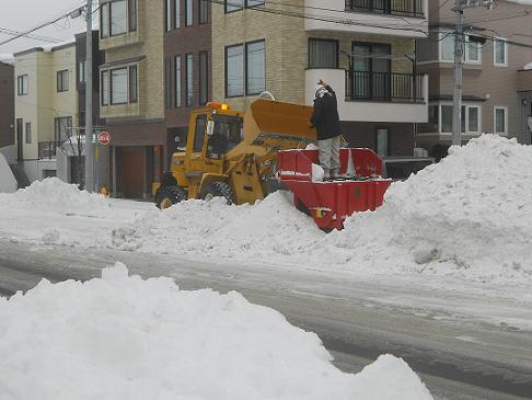 流雪溝への機械除雪