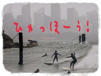 surfer in storm sydney