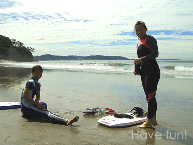 Surfer Girl On The Beach