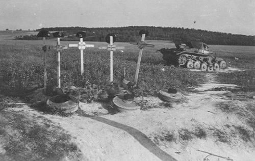 German panzer w graves Poland.jpg