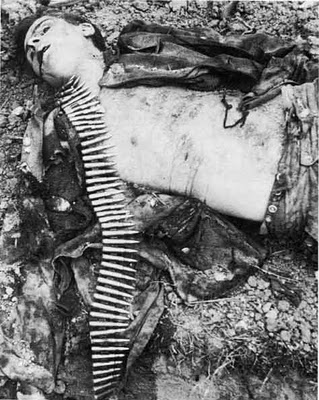 Dead machine gunner from 25 SS Panzergrenadier Regiment of Hitlerjugend beside a trench in Malon, Normandy 9_7_44.jpg