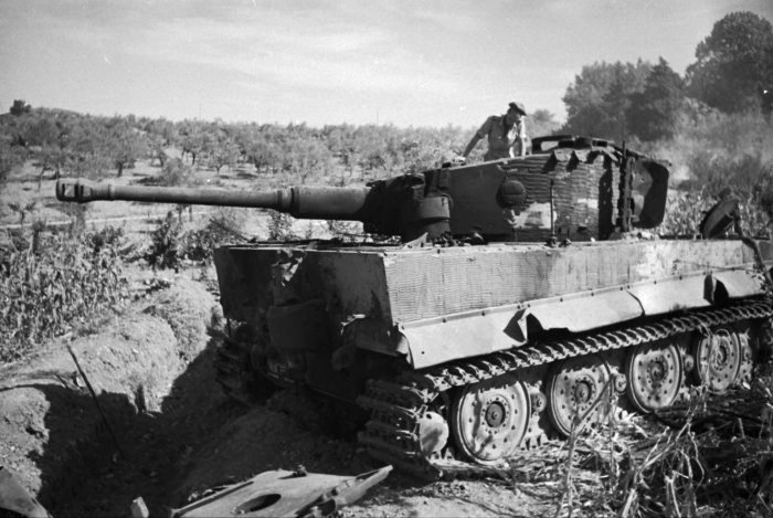 first_german_tiger_tank_knocked_out_by_nz_tanks_during_ww2_italy_26_july_1944__da06424f.jpg