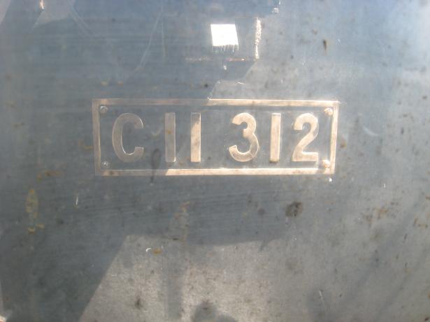 煙と車体プレート