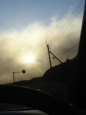 火山灰にかすむ太陽