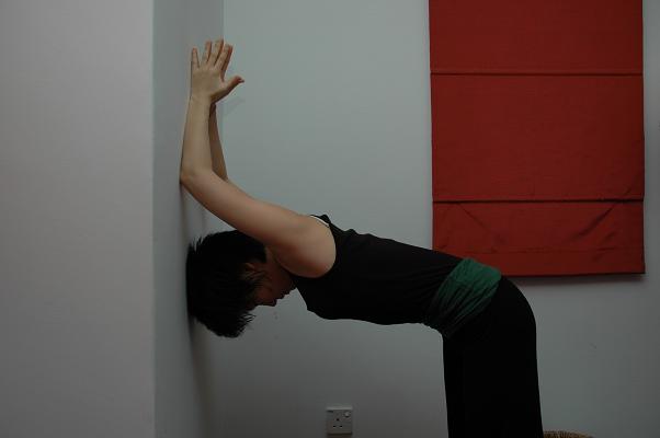 shoulder opening by wall
