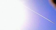 飛行機雲と太陽