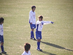 たかっさんに指示する田代真一