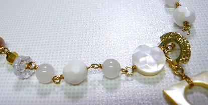 キュービック・シェルクロスネック(チェーンのアップ)