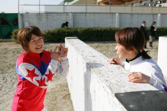 お話中