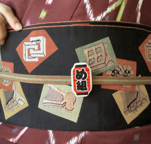 「め組」の帯留め