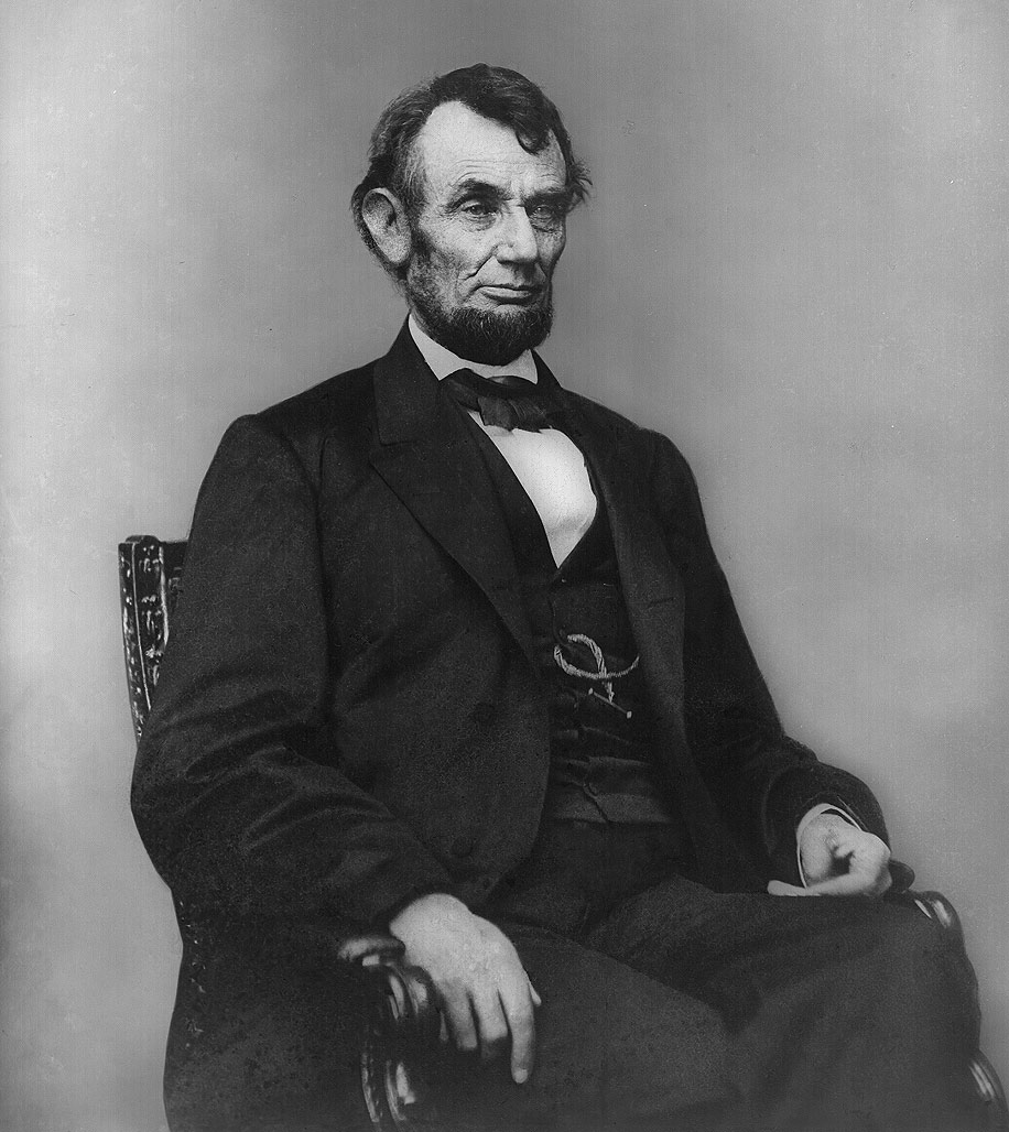Abraham_Lincoln_seated,_Feb_9,_1864.jpg