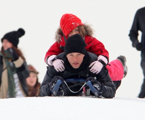 Actor Jude Law, 37, and his children, Rafferty, 13, Iris, 9 and Rudy, 7, went sledding together at Parliament Hill.jpg