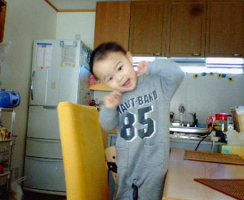 得意のポーズで