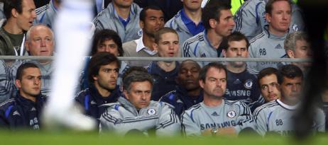 Jose Mourinho and Steve Clarke watch the game against Manchester United during the Premiership football match at Stamford Bridge in London 09 May 2007.jpg