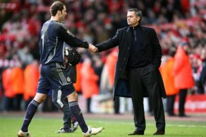 Jose Mourinho and Chelsea goalkeeper Petr Cech shake hands after the match.jpg