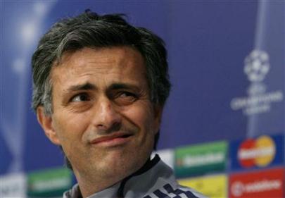 Mourinho reacts as he attends a news conference at Stamford Bridge.jpg