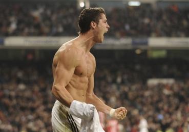 Ronaldo celebrates after cored scored his goalduring their Spanish La Liga soccer match against Almeria at the Santiago Bernabeu.jpg