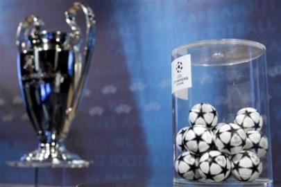 A pot with the balls containing the names of the soccer clubs is seen during the drawing of the games for the Champions League 200708 3rd qualifying round.jpg
