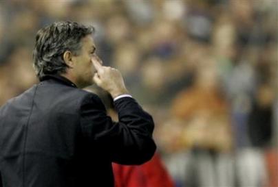 Jose Mourinho gestures during the second leg Champions league quarter final soccer match against Valencia at the Mestalla Stadium in Valencia.jpg