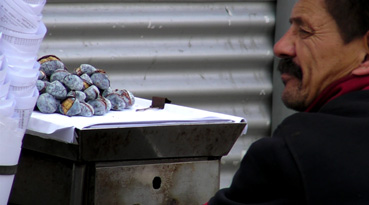 roast-chestnut stall in Praca da Figueira, Portugal