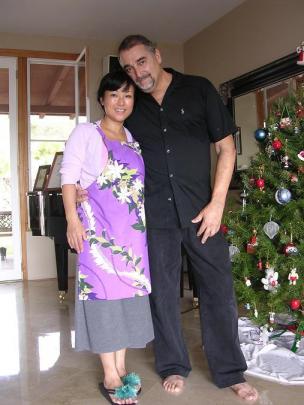 chiemi and frankie with christmas tree.jpg