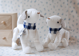 Twin dogs of white linen.png