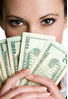 stock-photo-woman-holding-money-20739019.jpg