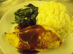 Orange herb-roasted chicken with chicken demi glace