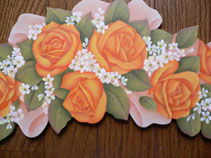 オレンジ色の薔薇飾り